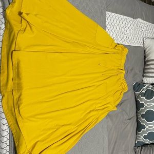 Medium, loose, flowey, yellow skirt